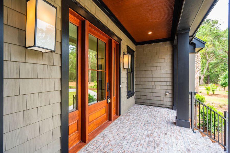 Exterior details and patio area of a home in , Johns Island (Image 52).