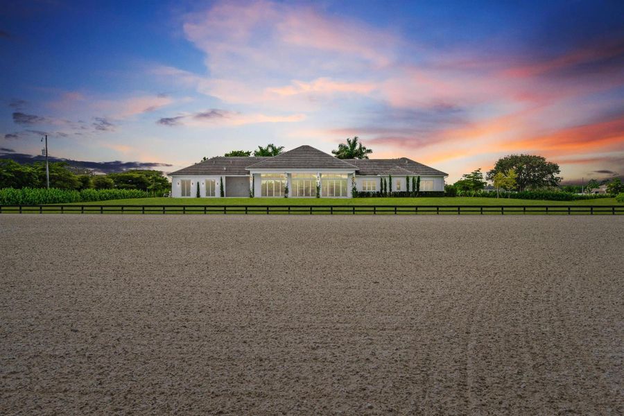 Front exterior of a new home in , Wellington, FL, highlighting curb appeal (Image 2). Front exterior of a new home in , Wellington, FL, highlighting curb appeal (Image 2).