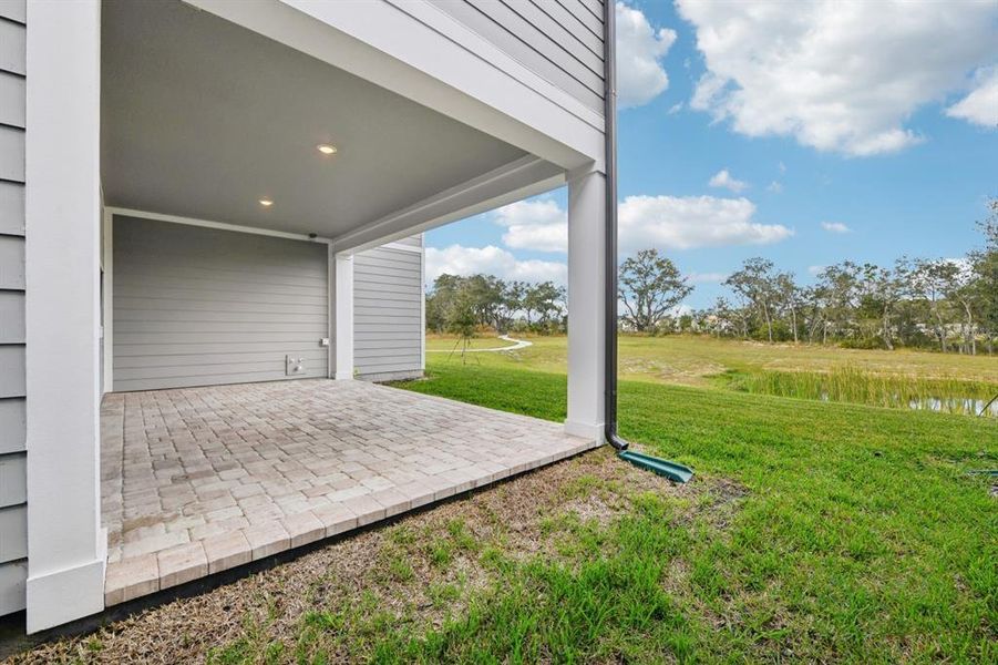 Exterior details and patio area of a home in Northlake Traditional, Winter Garden (Image 4). Exterior details and patio area of a home in Northlake Traditional, Winter Garden (Image 4).