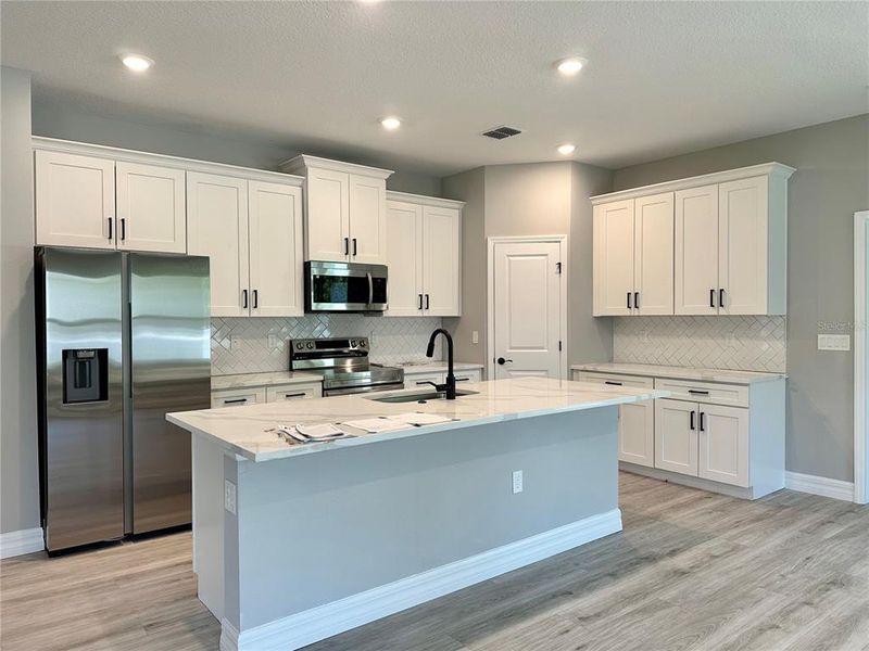 Furnished interior view inside a new home in , Ocala (Image 3).