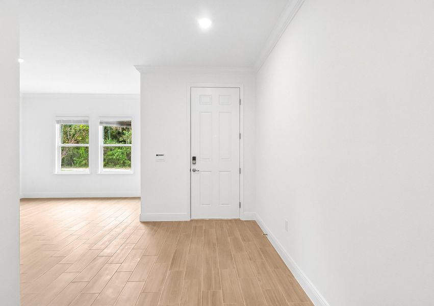 Spacious, unfurnished interior of a new home in Coastal Communities, New Smyrna Beach (Image 19). Spacious, unfurnished interior of a new home in Coastal Communities, New Smyrna Beach (Image 19).
