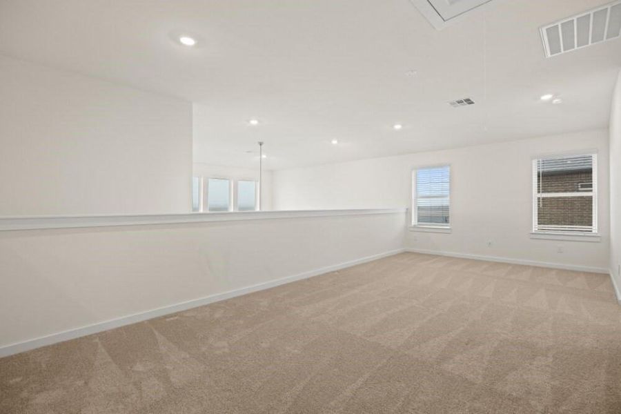 Spacious, unfurnished interior of a new home in Creekhaven, Iowa Colony (Image 22).