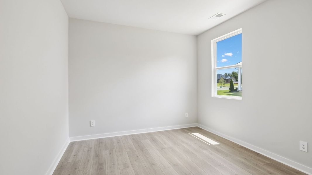 Representative unfurnished interior of a home built from the Ansley by D.R. Horton in Harvest Point, Spring Hill (Image 65).