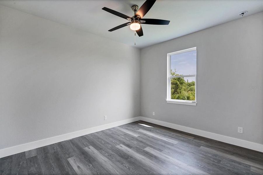 Spacious, unfurnished interior of a new home in , Port Charlotte (Image 20).