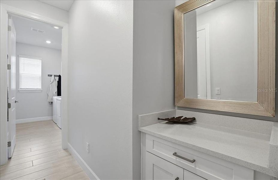 Furnished interior view inside a new home in Esplanade at Artisan Lakes, Palmetto (Image 32).