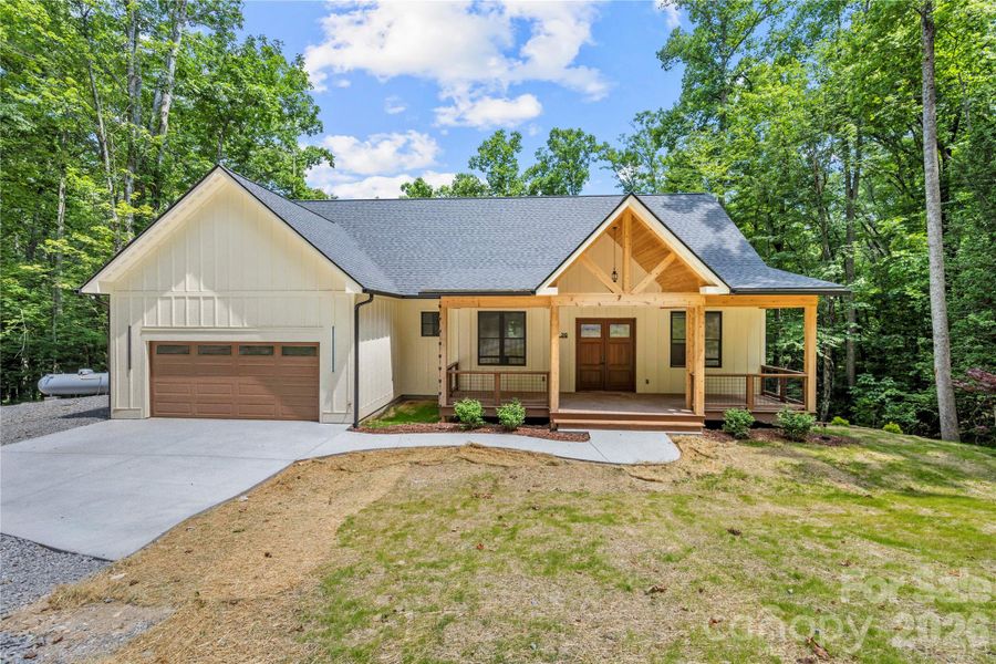 Front exterior of a new home in , Hendersonville, NC, highlighting curb appeal (Image 2). Front exterior of a new home in , Hendersonville, NC, highlighting curb appeal (Image 2).