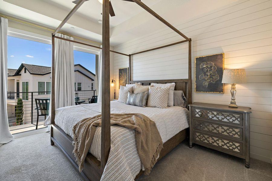 Peaceful primary bedroom that has two walk-in closets Peaceful primary bedroom that has two walk-in closets