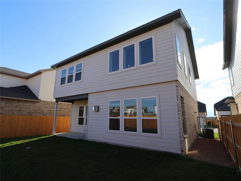 Exterior details and patio area of a home in Estancia West, Manchaca (Image 19).
