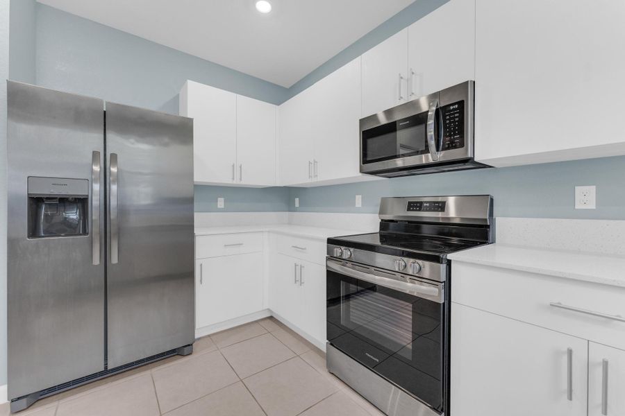 Furnished interior view inside a new home in , Coral Springs (Image 18).