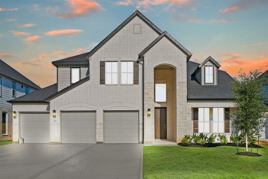 Front exterior of a new home in Beacon Hill, Waller, TX, highlighting curb appeal (Image 14). Front exterior of a new home in Beacon Hill, Waller, TX, highlighting curb appeal (Image 14).
