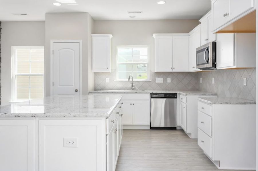 Representative furnished interior of a home built from the Freeport by Keystone Homes NC in Avondale, Greensboro (Image 7).