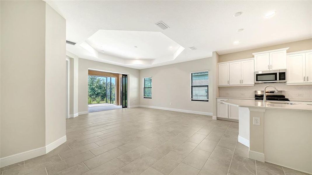 Spacious, unfurnished interior of a new home in Vicenza Real Estate and Homes for Sale in North Venice, FL - Neal Communities, Nokomis (Image 17).
