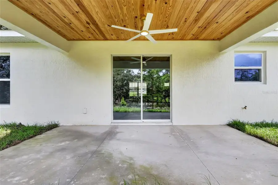 Exterior details and patio area of a home in , Ocala (Image 4).