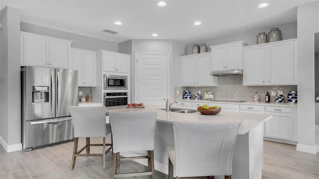 Furnished interior view inside a new home in Buena Lago, St. Cloud (Image 7).