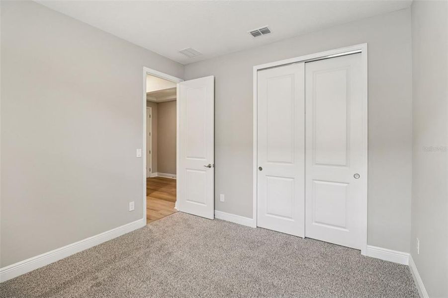 Spacious, unfurnished interior of a new home in Legends Preserve - Signature Series, Daytona Beach (Image 27).