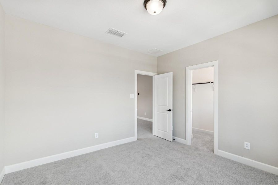 Spacious, unfurnished interior of a new home in Riceland 60’ Homesites, Mont Belvieu (Image 23).