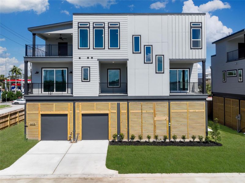 Front exterior of a new home in Lago Pointe, Seabrook, TX, highlighting curb appeal (Image 1). Front exterior of a new home in Lago Pointe, Seabrook, TX, highlighting curb appeal (Image 1).