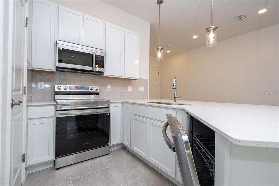 Furnished interior view inside a new home in Paradiso Grande, Orlando (Image 12).
