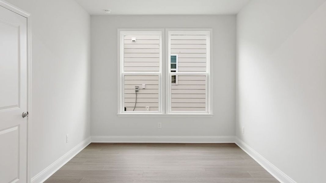 Spacious, unfurnished interior of a new home in Sun City Hilton Head, Bluffton (Image 21).