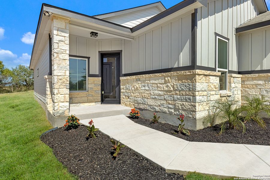 Front exterior of a new home in , San Antonio, TX, highlighting curb appeal (Image 18). Front exterior of a new home in , San Antonio, TX, highlighting curb appeal (Image 18).