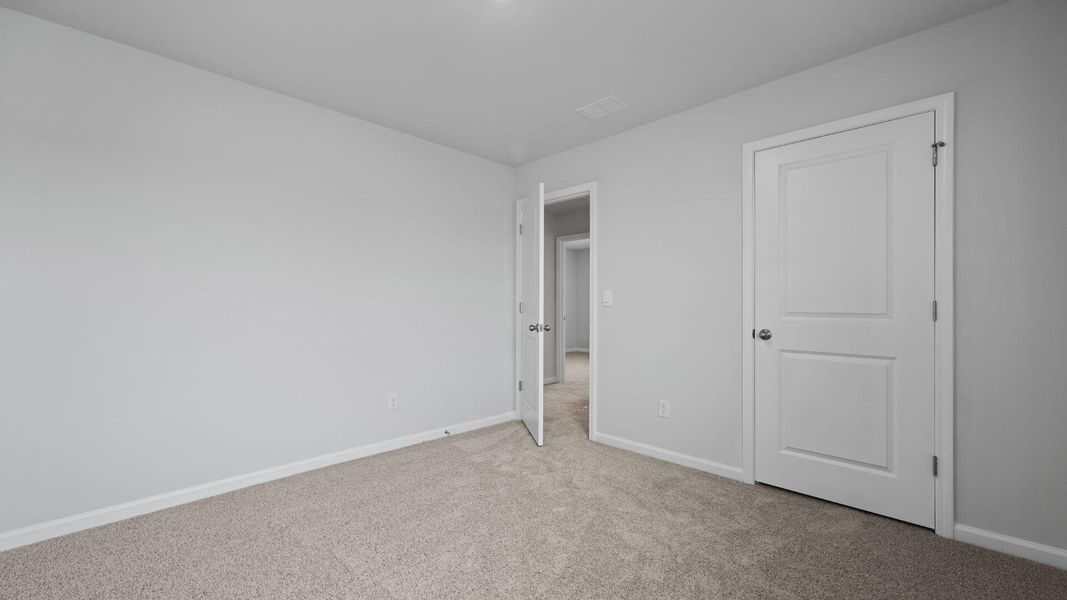 Spacious, unfurnished interior of a new home in Pine Hills at Cane Bay, Summerville (Image 12). Spacious, unfurnished interior of a new home in Pine Hills at Cane Bay, Summerville (Image 12).
