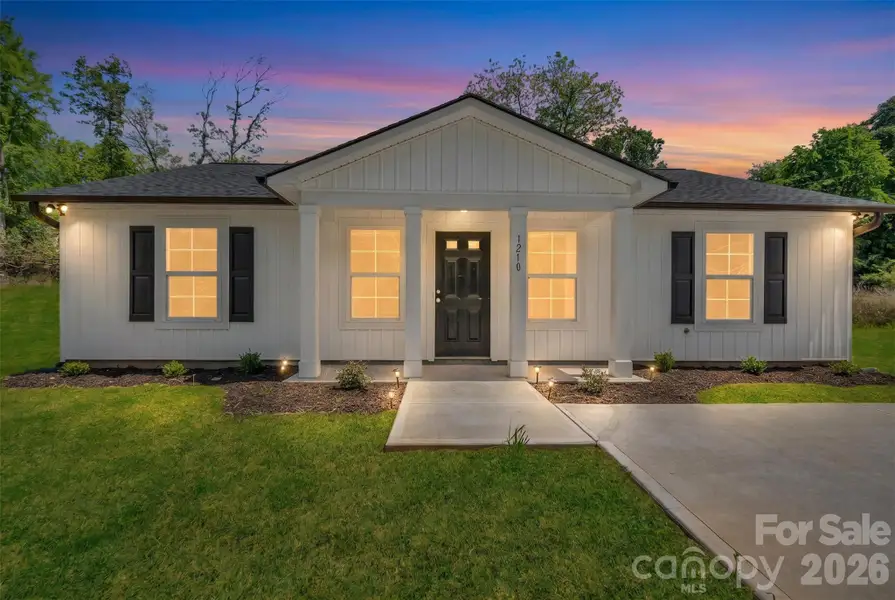 Front exterior of a new home in , Lancaster, SC, highlighting curb appeal (Image 20).