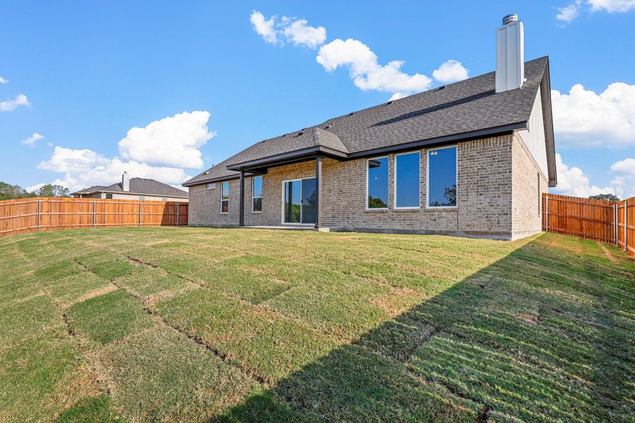 Representative exterior photo of a completed home built from the Garrison II by Cheldan Homes in Stoneview, Glen Rose, TX (Image 30).