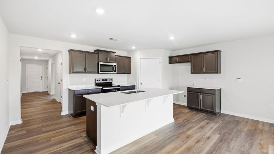 Furnished interior view inside a new home in Lakestone, Woodruff (Image 7).