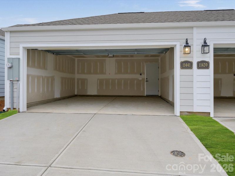 Exterior details and patio area of a home in North Creek Village, Huntersville (Image 20).