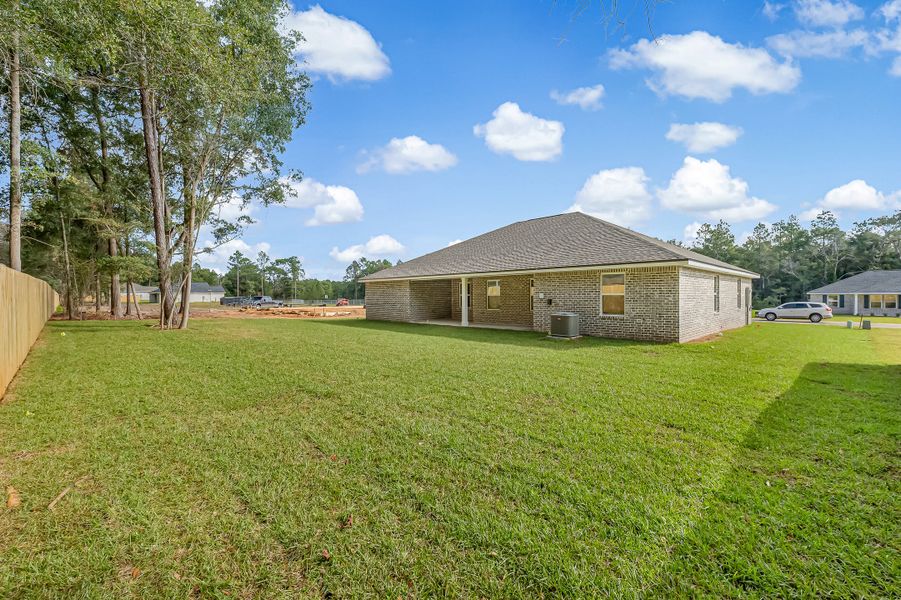 Exterior details and patio area of a home in Southern Day Chateau, Baker (Image 31).