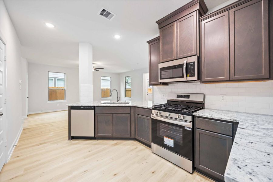 Furnished interior view inside a new home in Granger Pines, Conroe (Image 7). Furnished interior view inside a new home in Granger Pines, Conroe (Image 7).