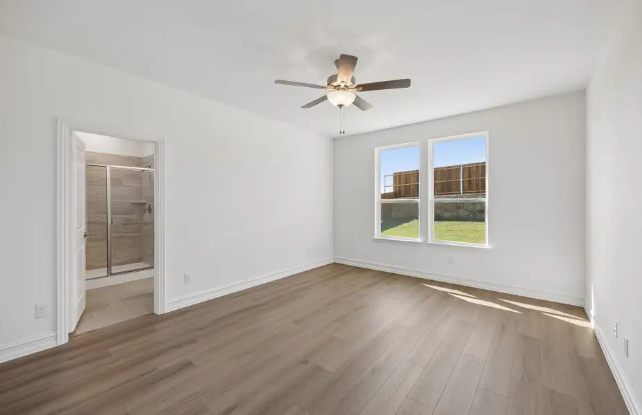 Spacious, unfurnished interior of a new home in Rosemary Fields, Godley (Image 13).