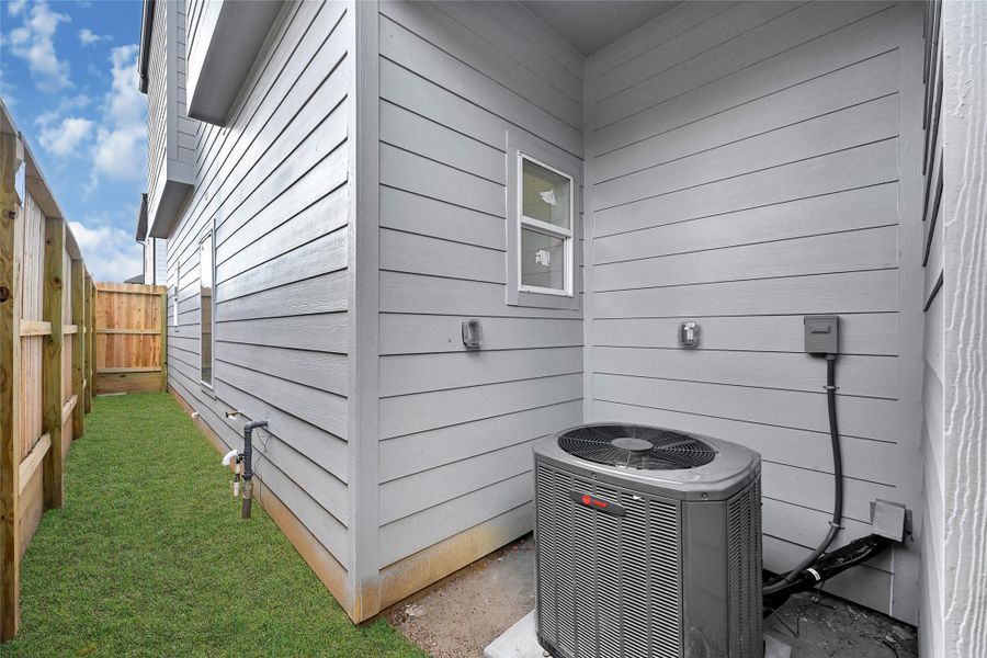 Exterior details and patio area of a home in , Houston (Image 4). Exterior details and patio area of a home in , Houston (Image 4).