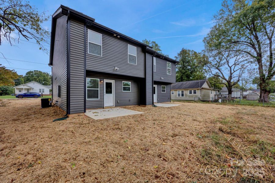 Exterior details and patio area of a home in , Concord (Image 3).
