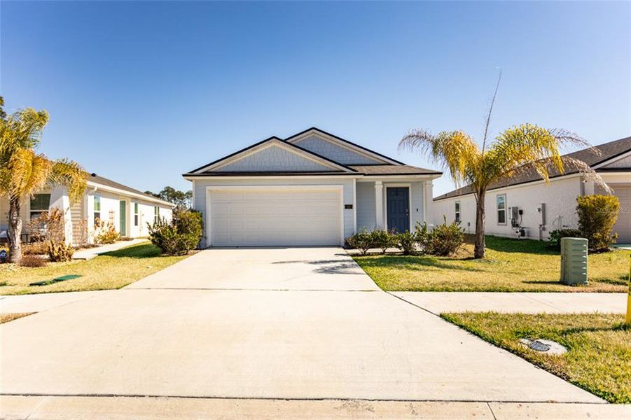 Front exterior of a new home in , Bunnell, FL, highlighting curb appeal (Image 2). Front exterior of a new home in , Bunnell, FL, highlighting curb appeal (Image 2).