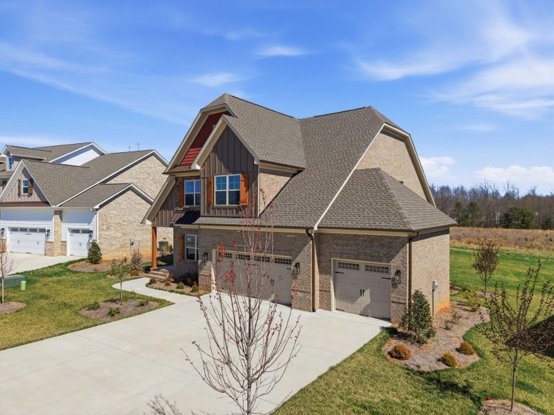 Representative exterior photo of a completed home built from the Hampton by Keystone Homes NC in Preserve at Carriage Cove, Oak Ridge, NC (Image 40).
