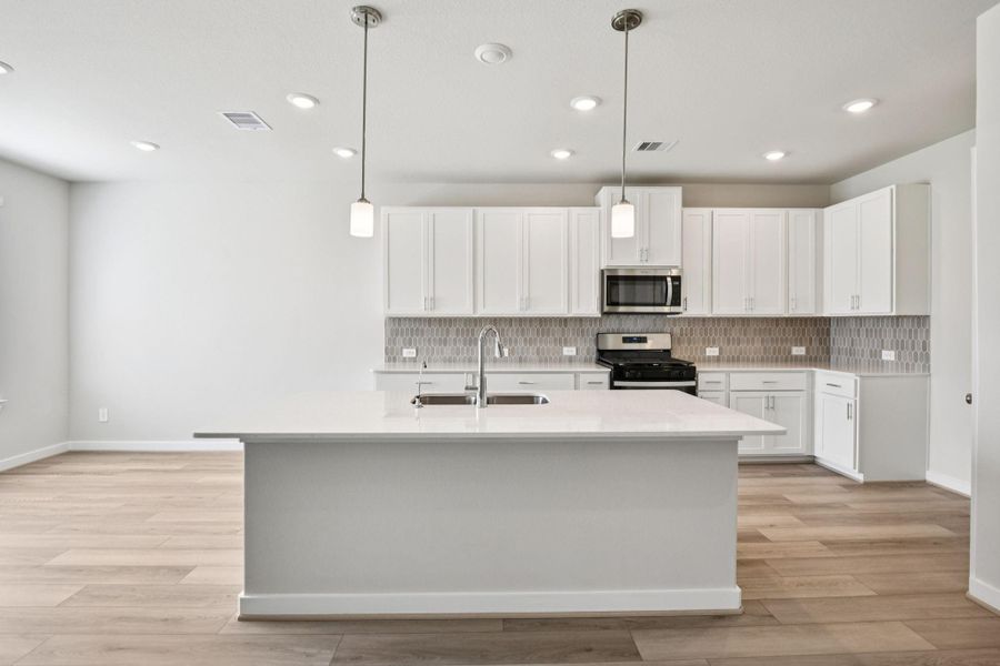 Photo is not of the actual home, but is an inspirational photo of builder’s model home and may depict options, furnishings, and/or decorator features that are not included