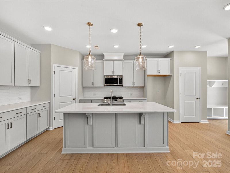 Furnished interior view inside a new home in North Creek Village - Townhomes, Huntersville (Image 7).