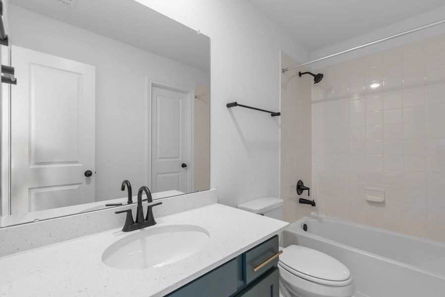 Secondary bathroom. Sample product photo. Actual exterior and interior selections may vary by homesite. Photo may be virtually staged. Secondary bathroom. Sample product photo. Actual exterior and interior selections may vary by homesite. Photo may be virtually staged.