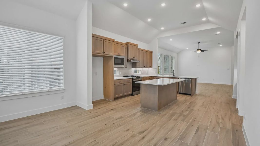 Furnished interior view inside a new home in Artavia, Conroe (Image 8).