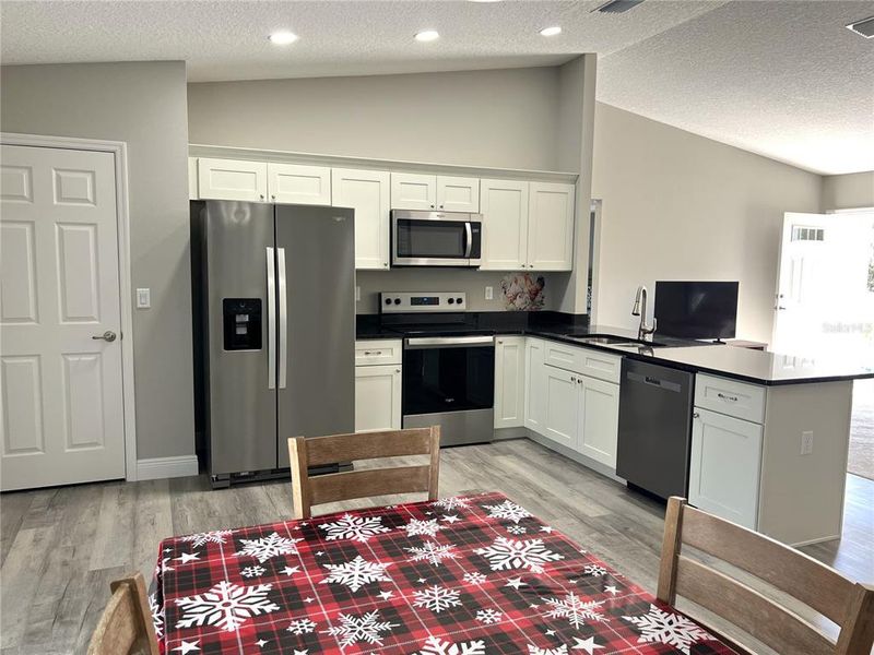 Furnished interior view inside a new home in , Dunnellon (Image 6).