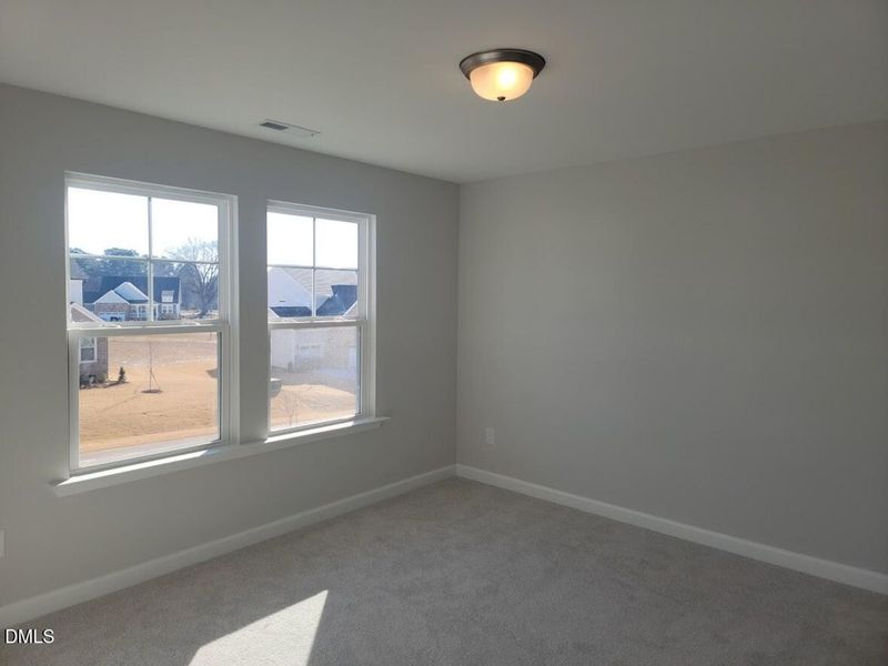 Spacious, unfurnished interior of a new home in Tobacco Road, Angier (Image 31).
