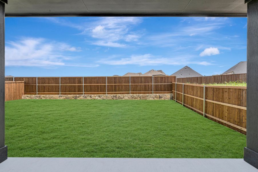 Exterior details and patio area of a home in Sandbrock Ranch, Aubrey (Image 4). Exterior details and patio area of a home in Sandbrock Ranch, Aubrey (Image 4).
