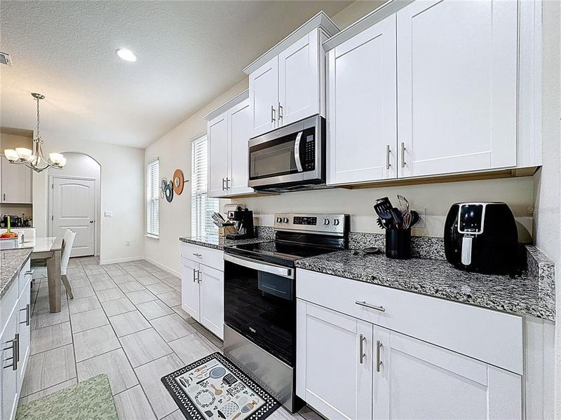 Furnished interior view inside a new home in , Winter Garden (Image 35).