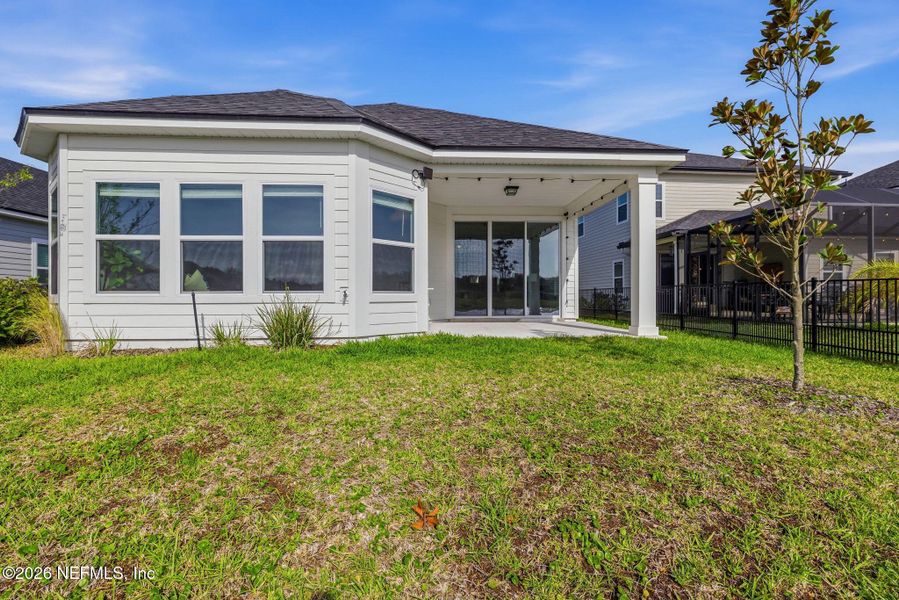 Exterior details and patio area of a home in Beacon Lake, St. Augustine (Image 26).