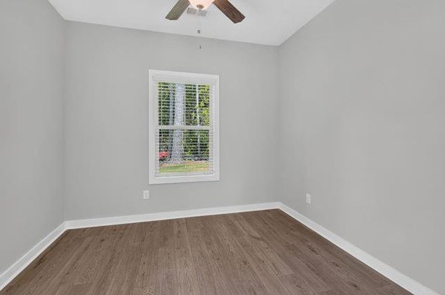 Spacious, unfurnished interior of a new home in The Cottages at East Lanier, Fayetteville (Image 25).
