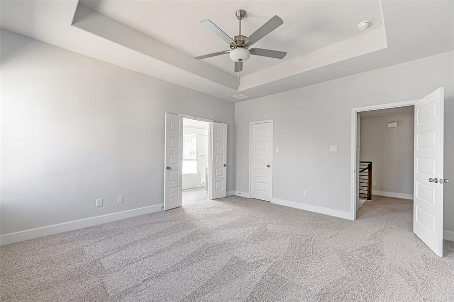 Primary Bathroom is oversized with tray ceiling