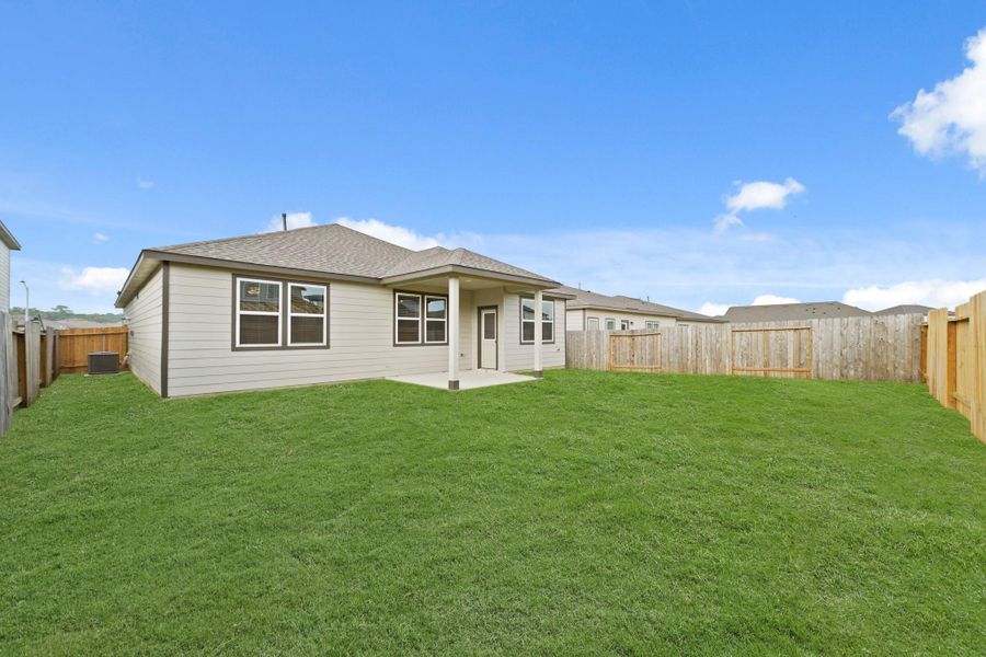 Exterior details and patio area of a home in Liberty Collection at Granger Pines, Conroe (Image 3). Exterior details and patio area of a home in Liberty Collection at Granger Pines, Conroe (Image 3).