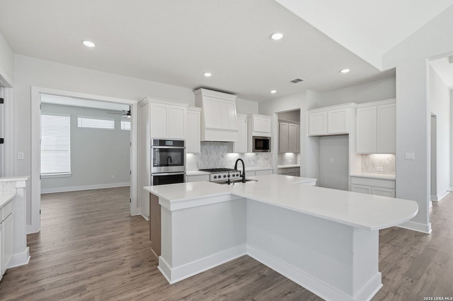 Furnished interior view inside a new home in Potranco Oaks, Castroville (Image 19).