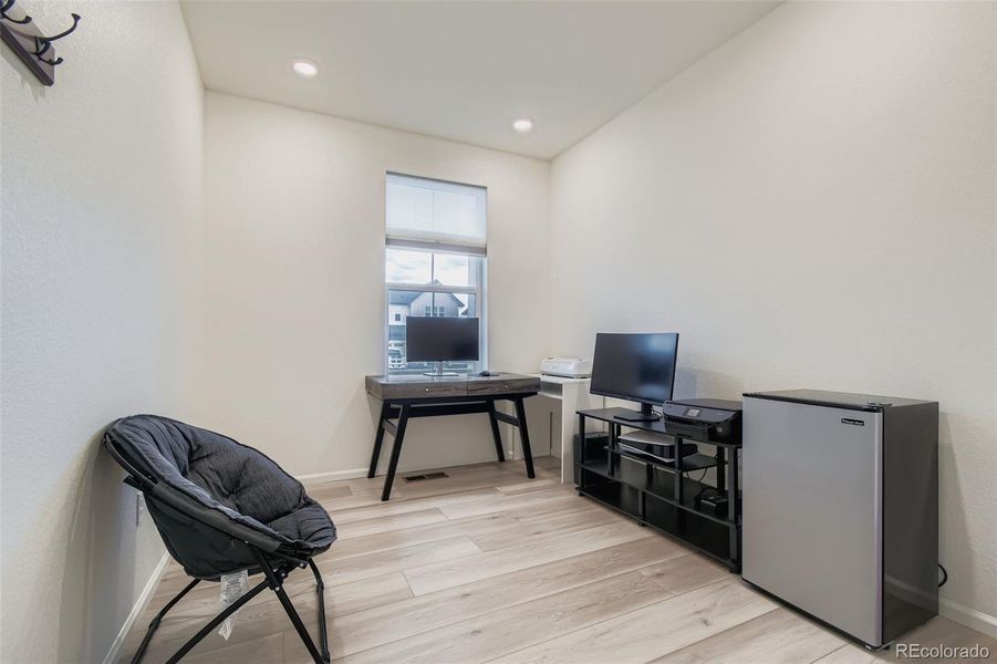 Great entry room, with flexible options. Make it an office or a craft room!